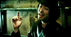 A screen shot from its music video. A screen shot from its music video.