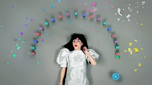 A screen shot from its music video. A screen shot from its music video.