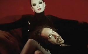 A screen shot from its music video. A screen shot from its music video.