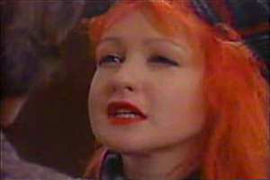 A screen shot from its music video. A screen shot from its music video.